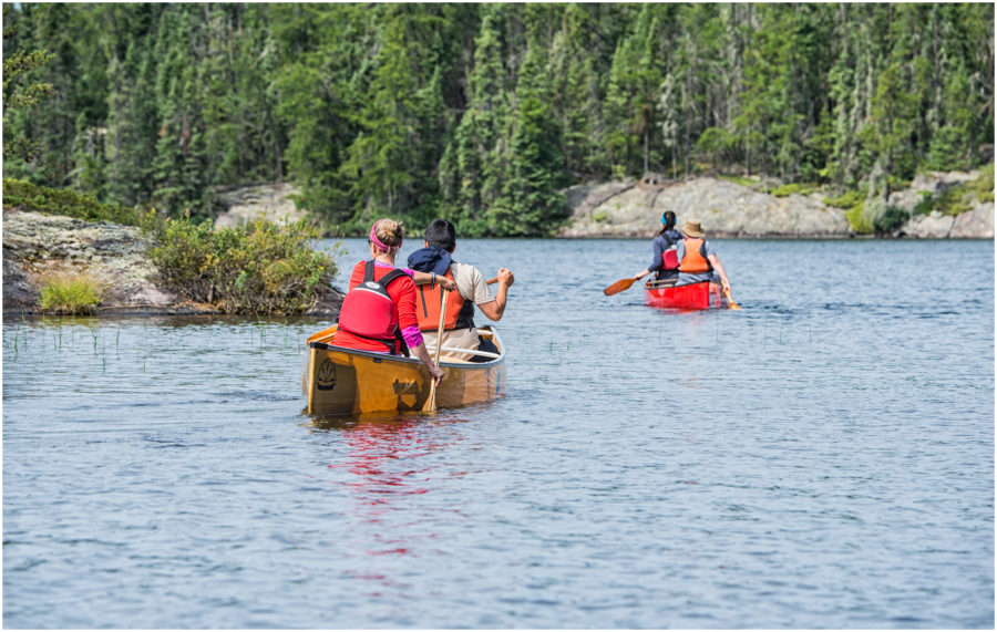 two canoes out on the lake