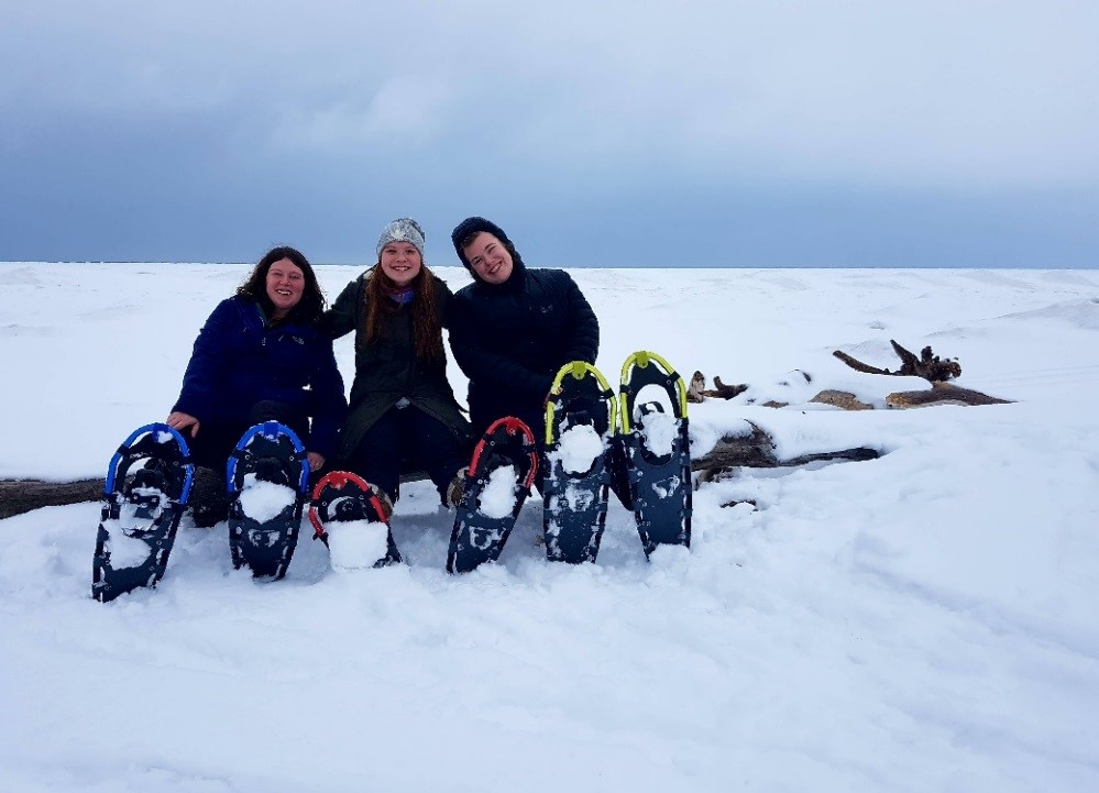 snowshoers on Lake Huron shoreline