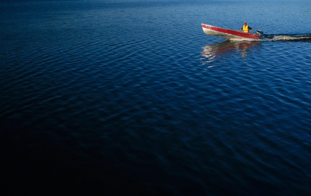 motor boat on large lake