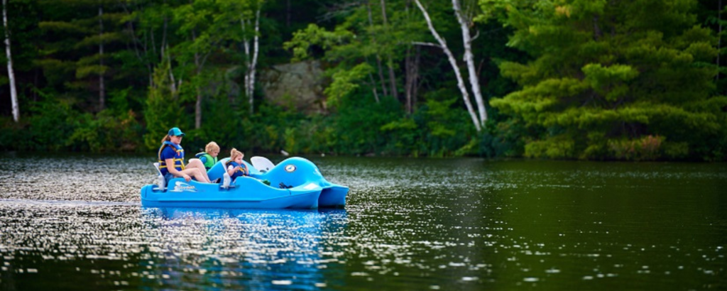 People on a paddleboat in the water