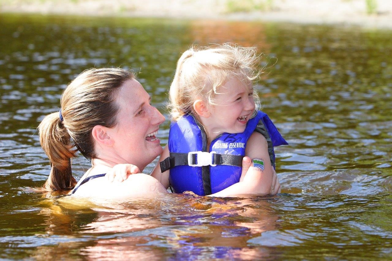 mother and child in water