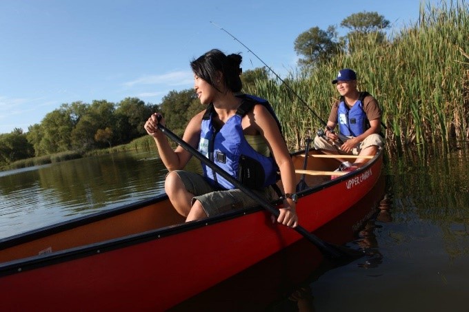 two paddlers in a canoe