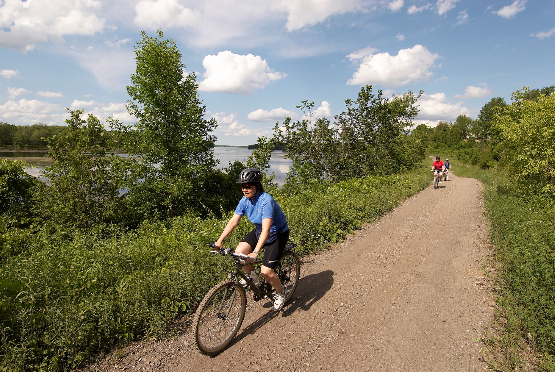 two bikers on a dirt trail