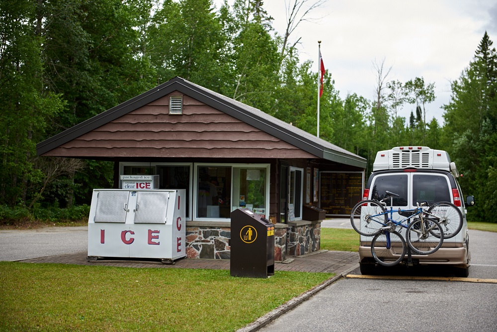 van at front gate