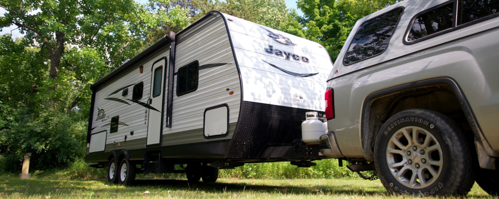 RV backing into campsite