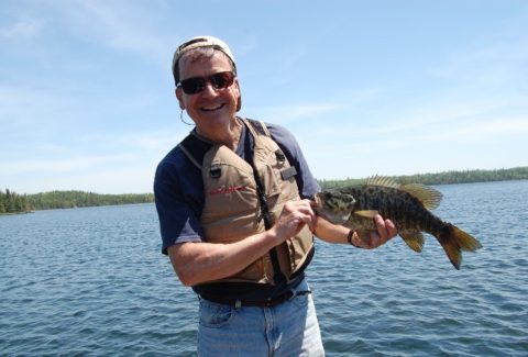 man holding fish