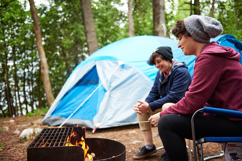 couple sitting at fire