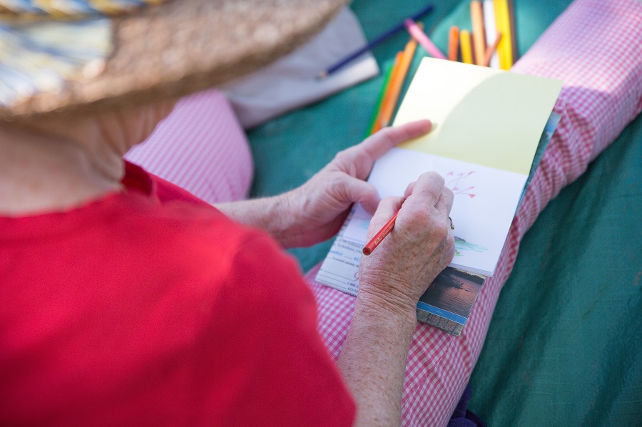 Looking over the shoulder of someone drawing.