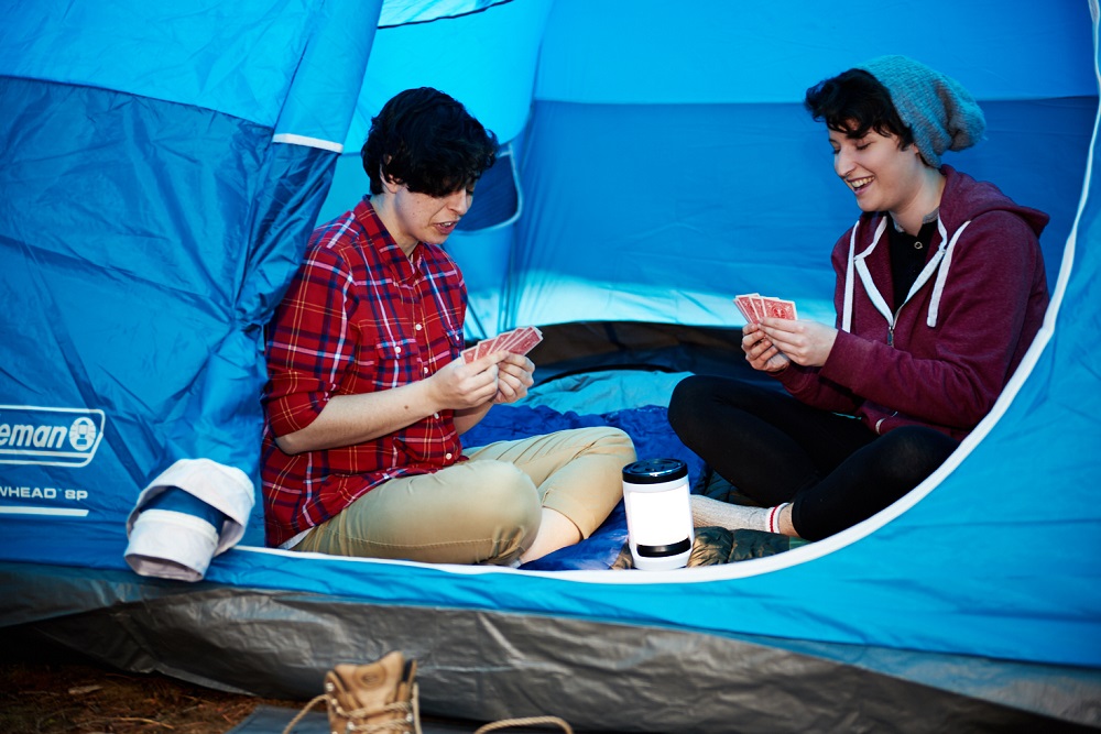 playing cards in tent