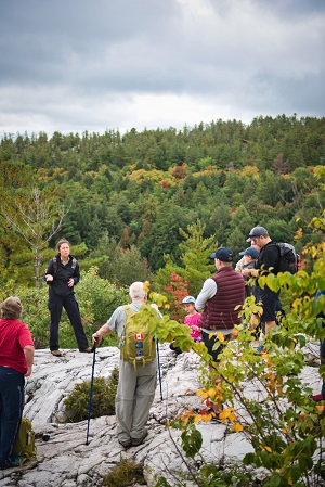 staff leading hike