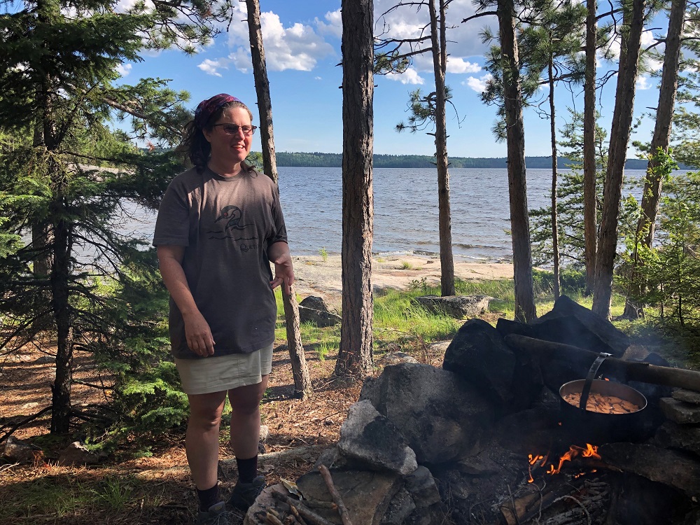 person standing on campsite