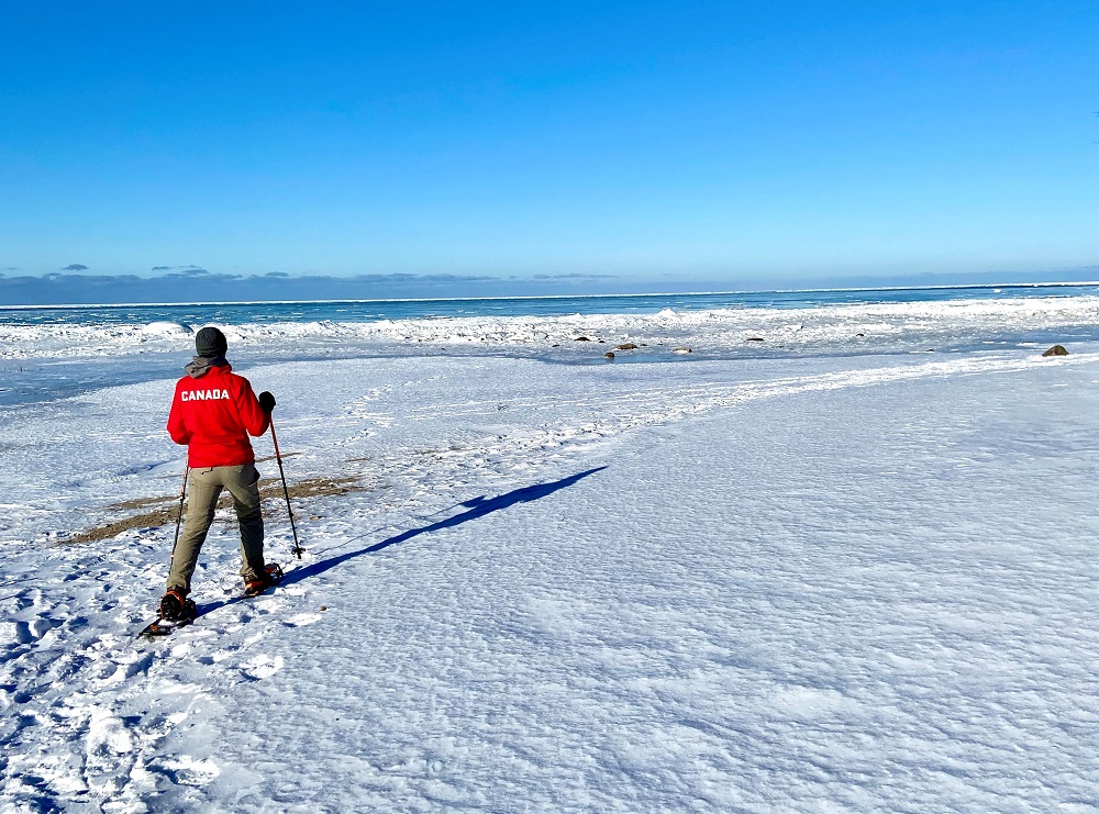 A winter hiker on a trail