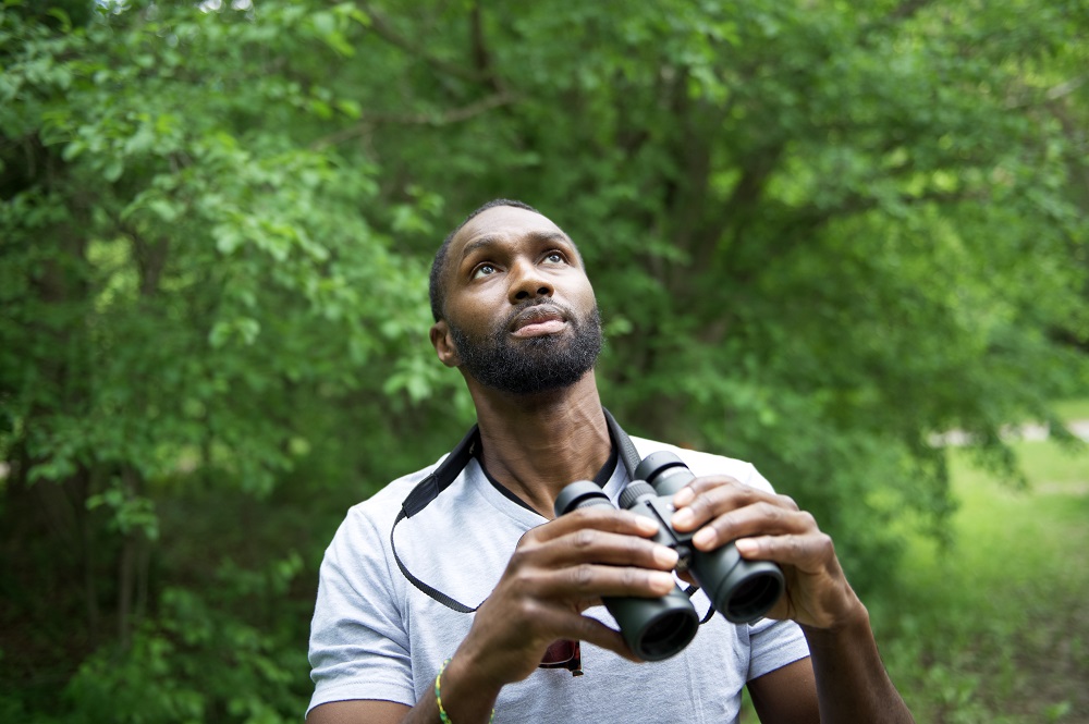 man with binoculars