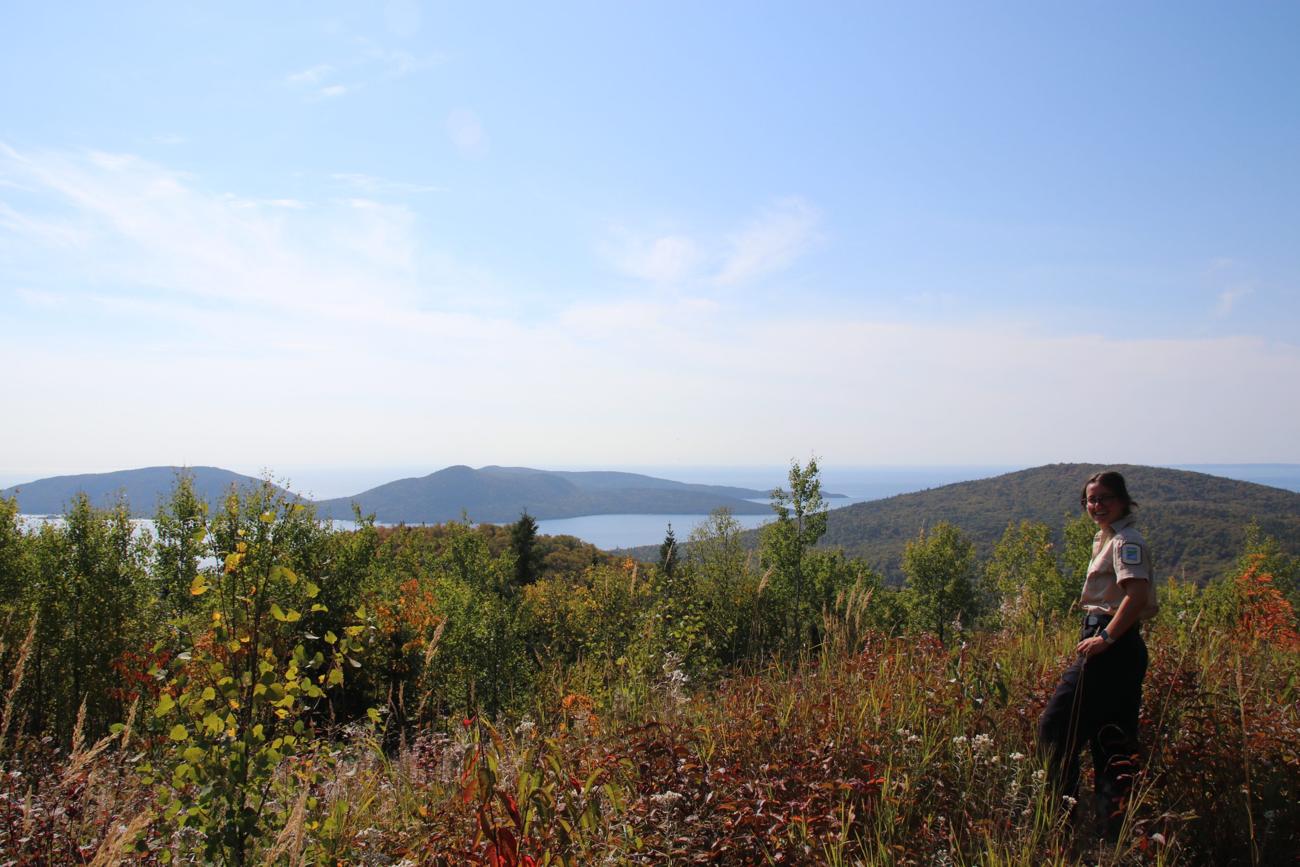 Staff standing at the top of the Pic Island overlook in Neys Provincial Park