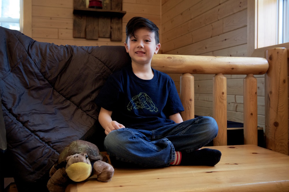 child wearing turtle shirt