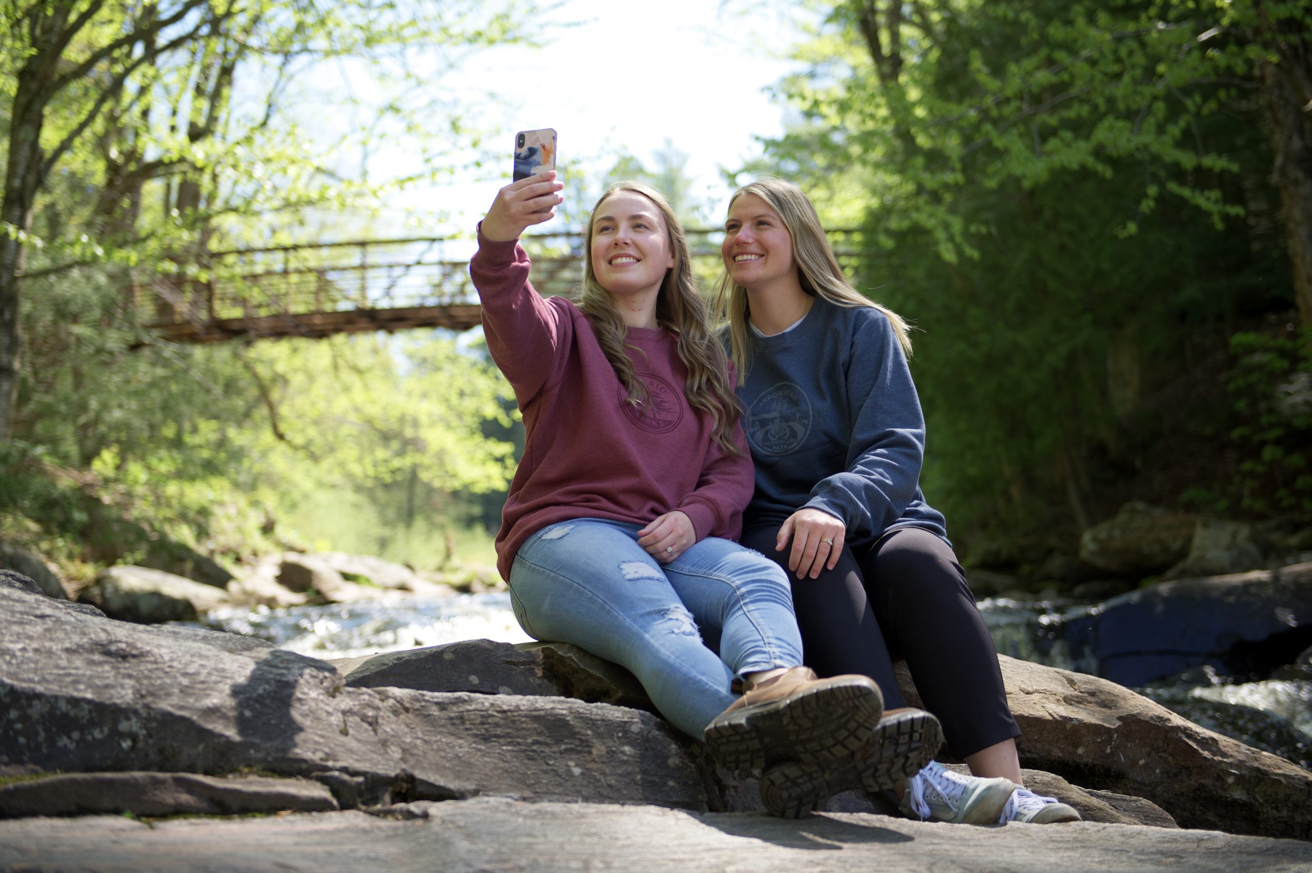 Two friends taking a selfie at Stubb's Falls at Arrowhead Provincial Park