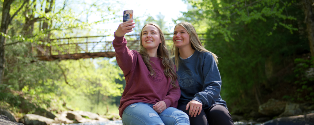Two friends taking a selfie at Stubb's Falls at Arrowhead Provincial Park
