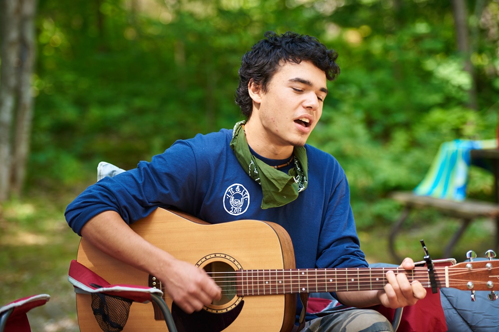 person playing guitar