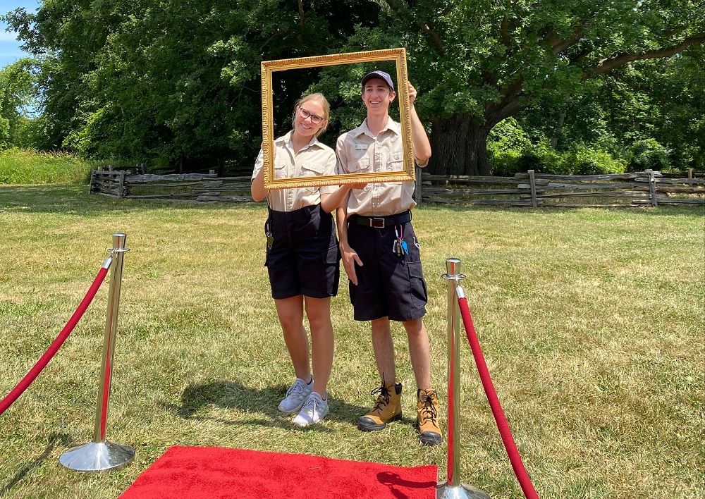 staff holding up frame