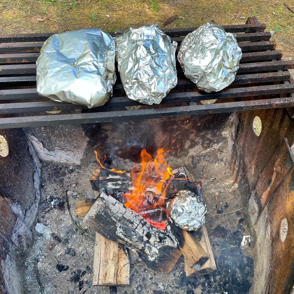 baked potatoes on grill