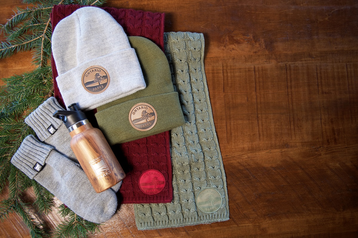 toques, scarves, mitts on a table