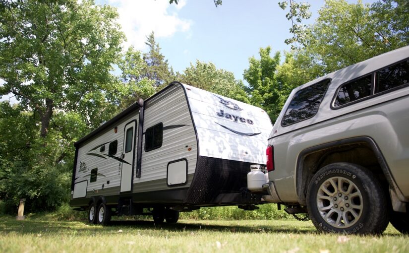 RV backing into campsite