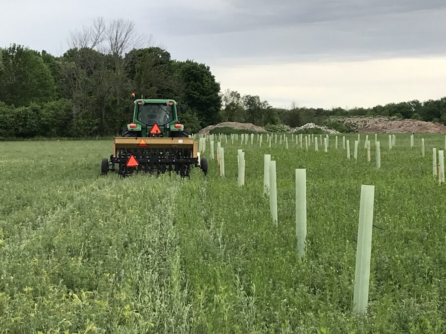 machinery at work in meadow