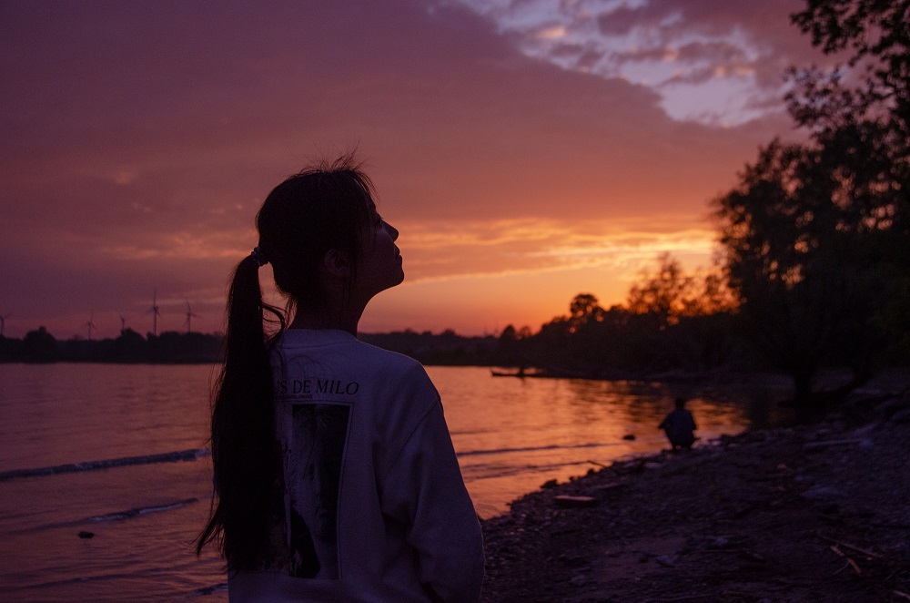 Silhouette at sunset over lake