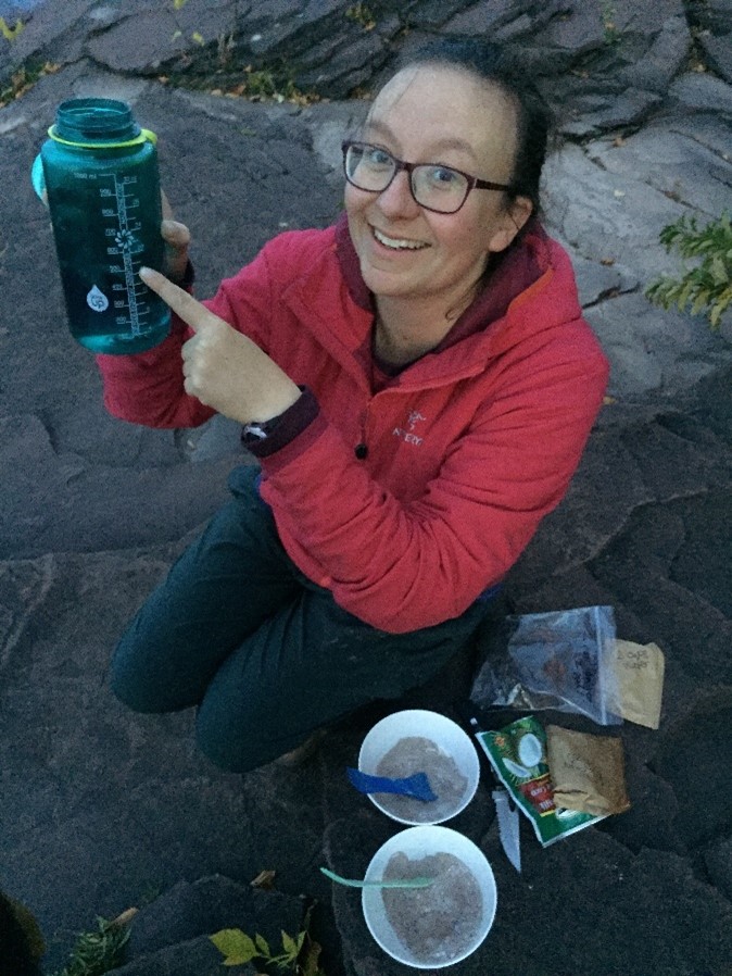 woman holding nalgene