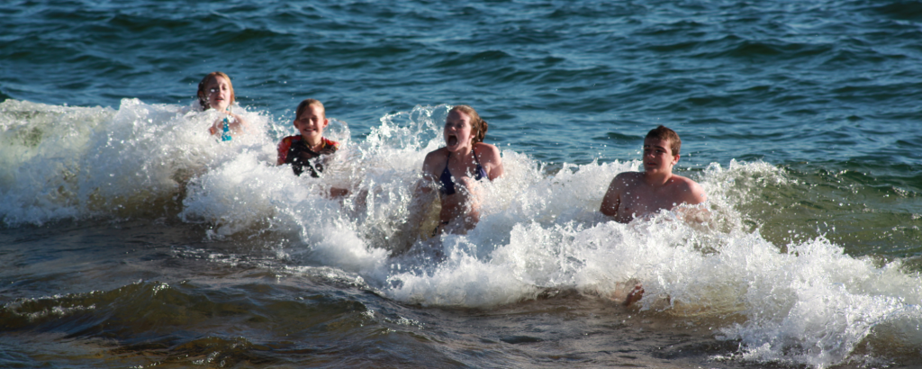 Staff swimming in the lake