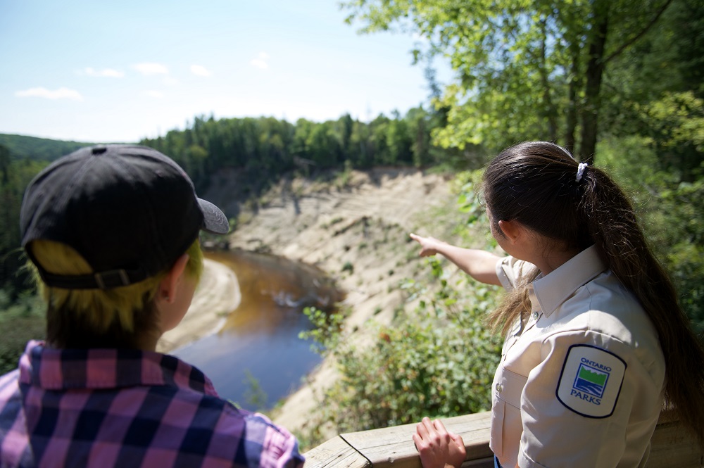 staff showing visitor geological feature