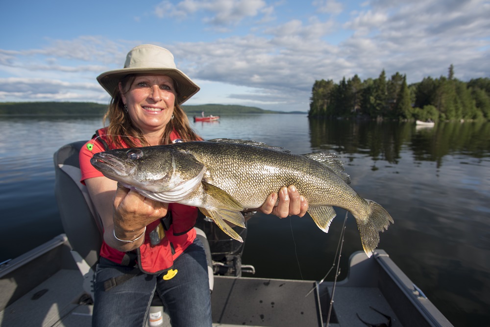 woman holding fish