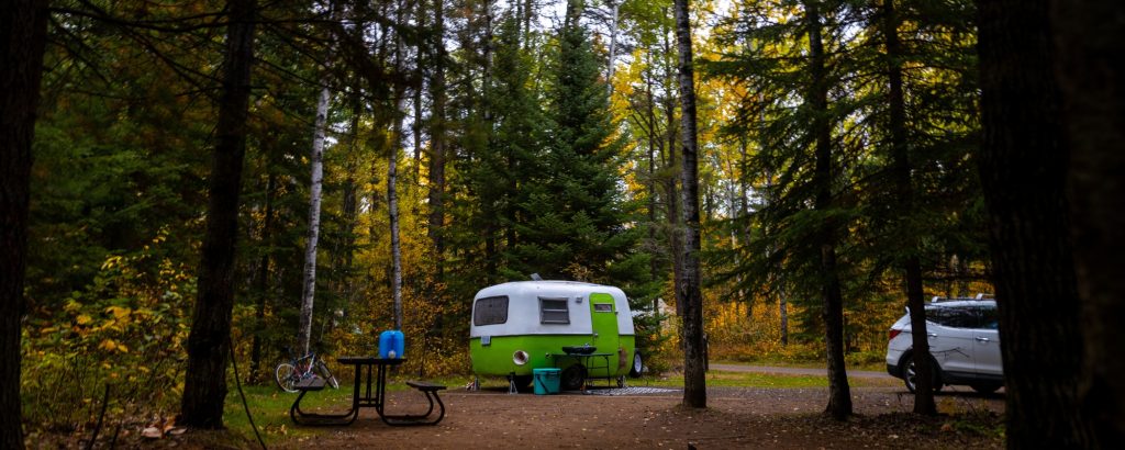 RV in forested campground