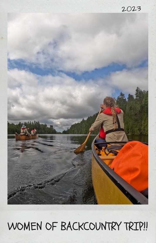 polaroid of person paddling canoe, following second canoe