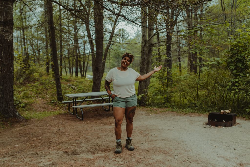 woman posing on campsite