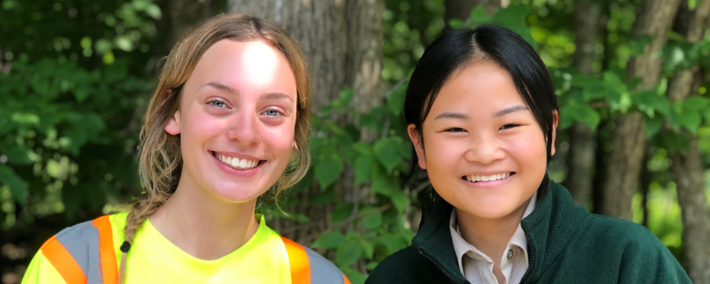 Two staff members in Ontario Parks uniforms smiling