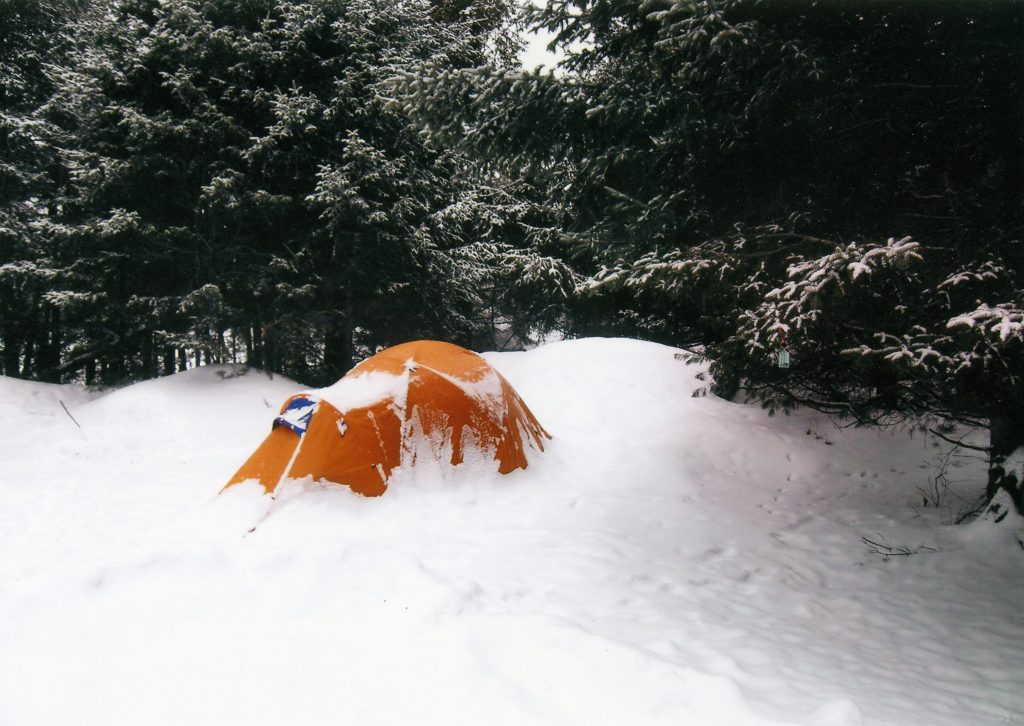 tent covered in snow