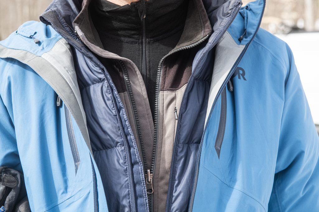 close up of person's jacket layers
