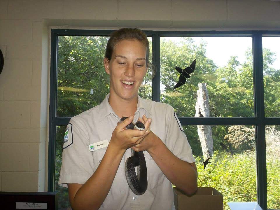 staff holding Hognose Snake