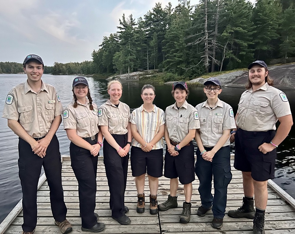 group of staff standing on dock