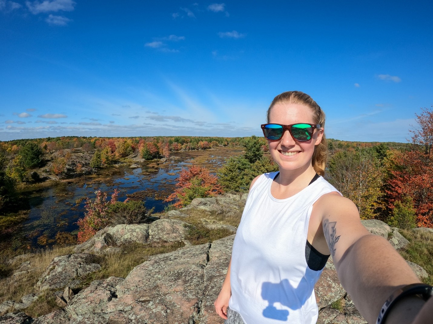 woman talking selfie on top of lookout