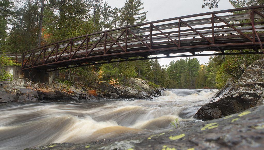 river running under bridge