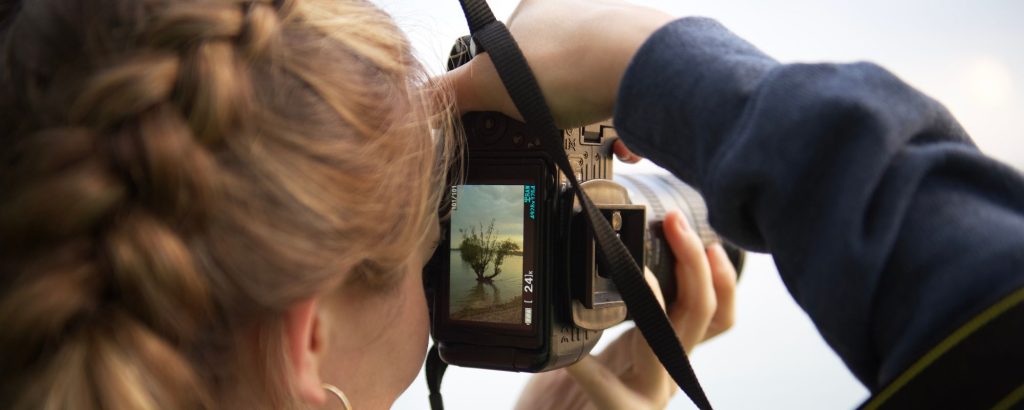 viewfinder of woman taking photo