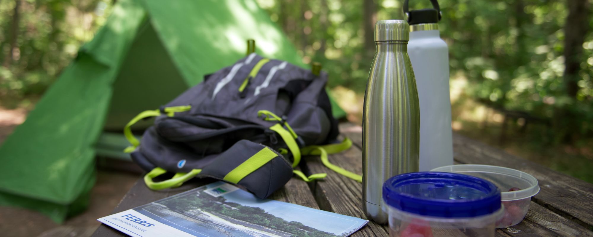 camping equipment on picnic table