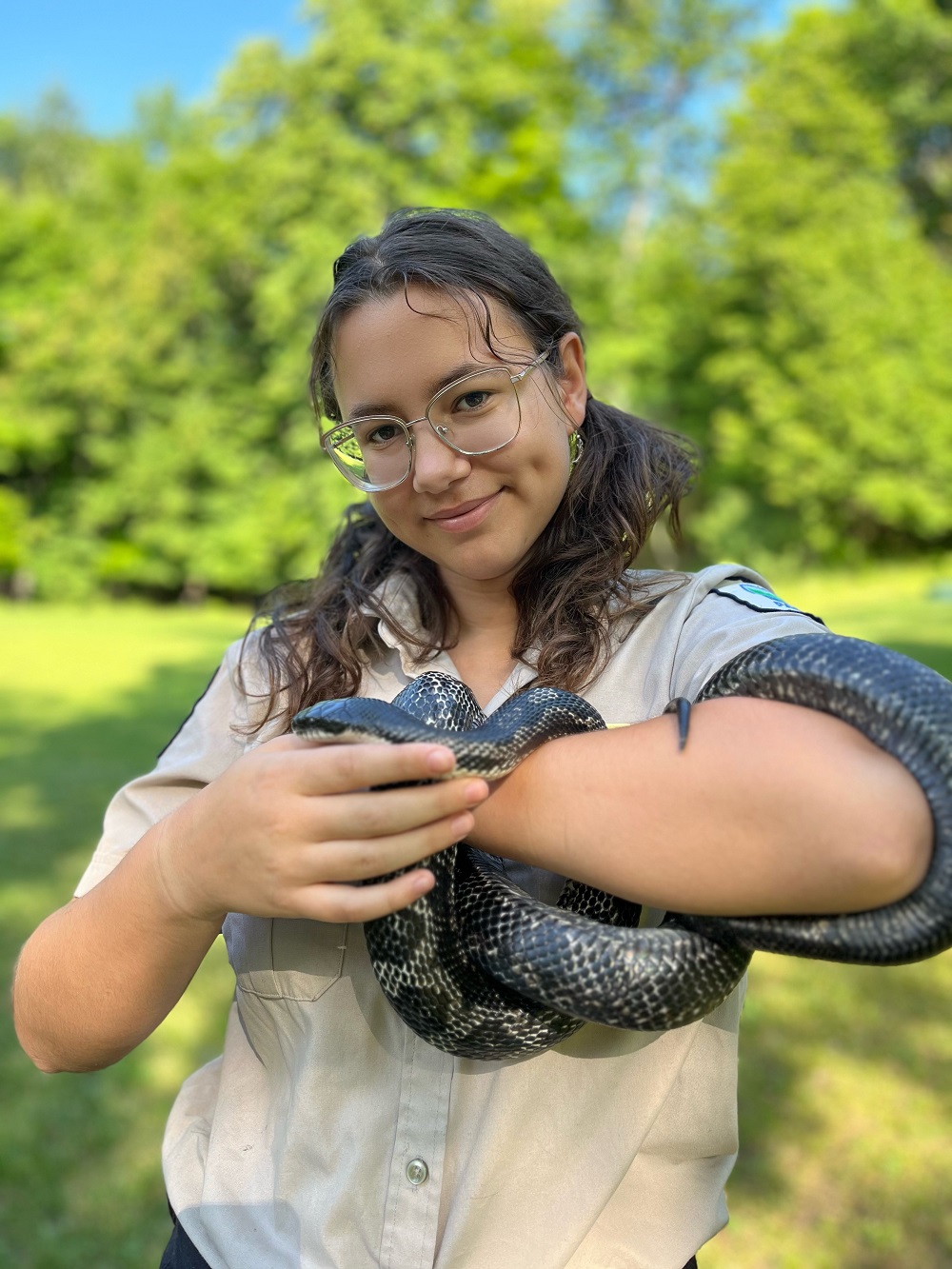 staff holding snake