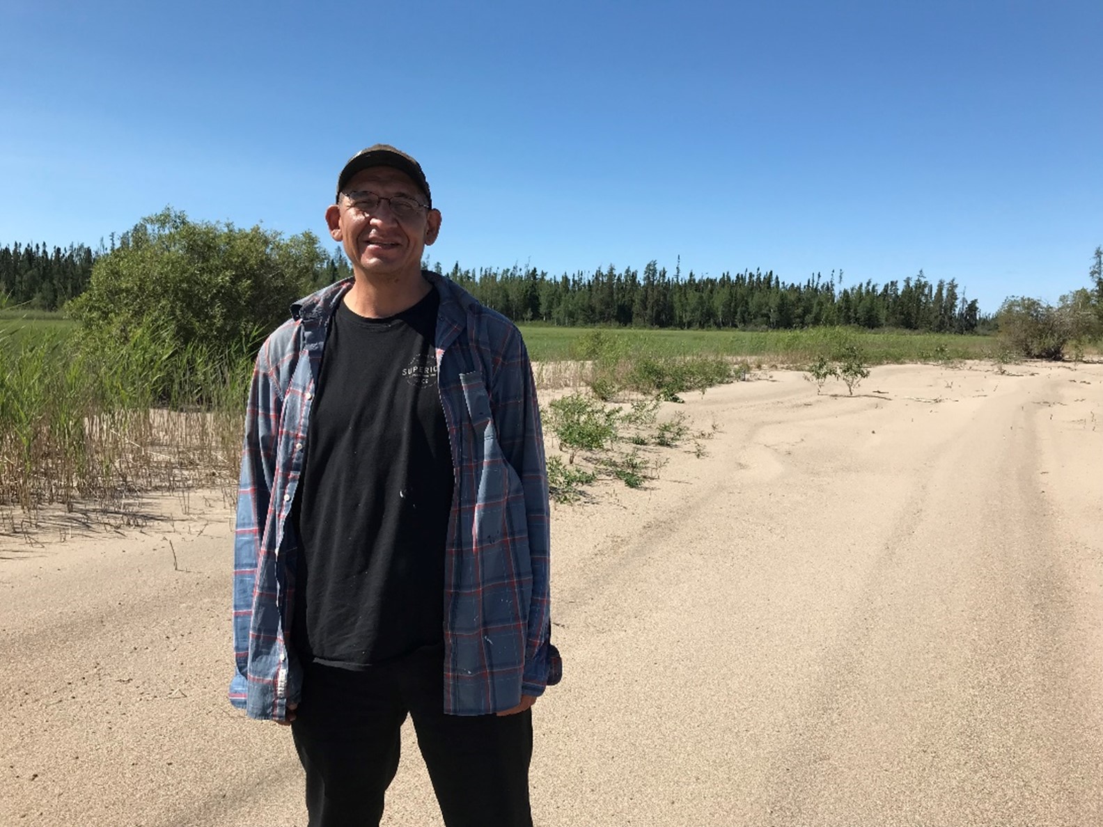 man standing on beach