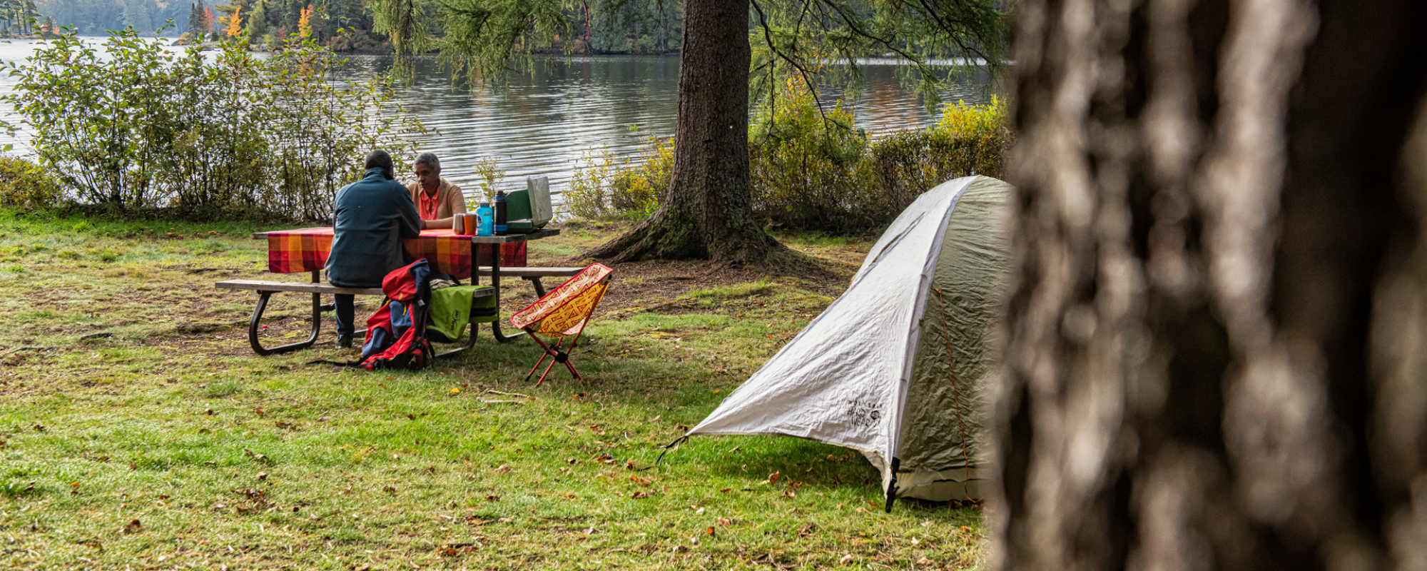 Couple camping during fall