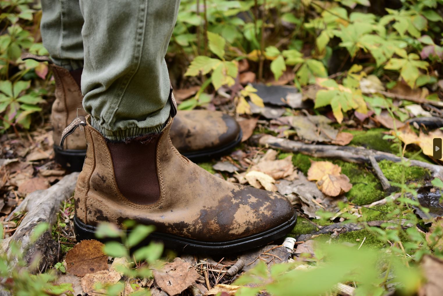 close up of boots on trail