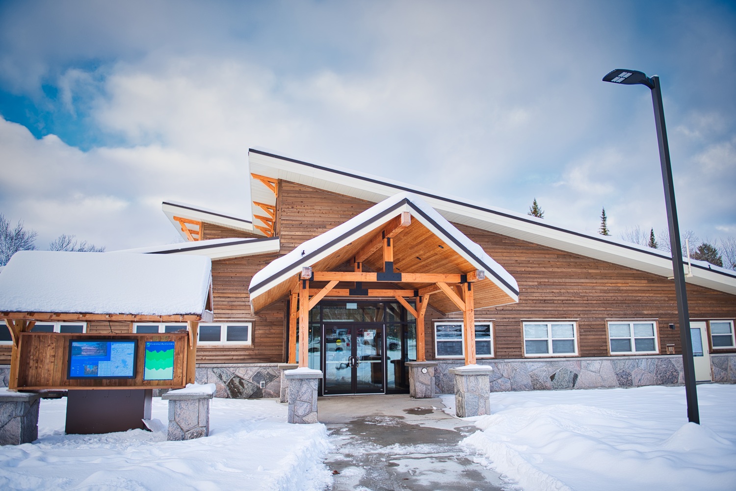 The Visitor Centre / Park Store in winter. A large modern building with slanted roof