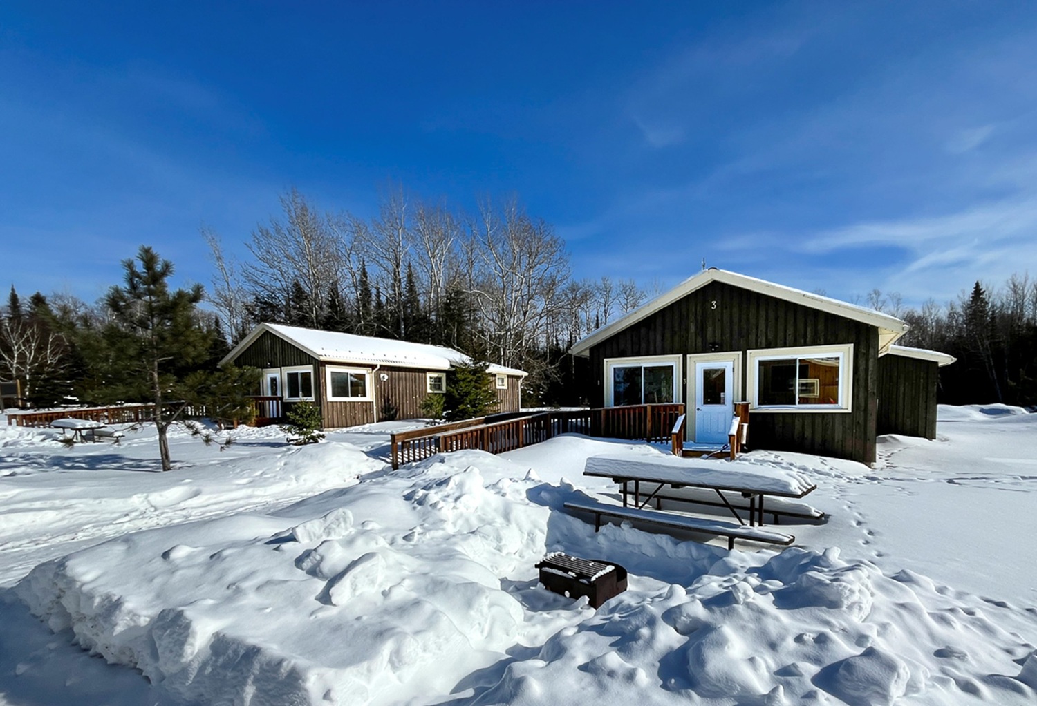wood cabins in snowy campground